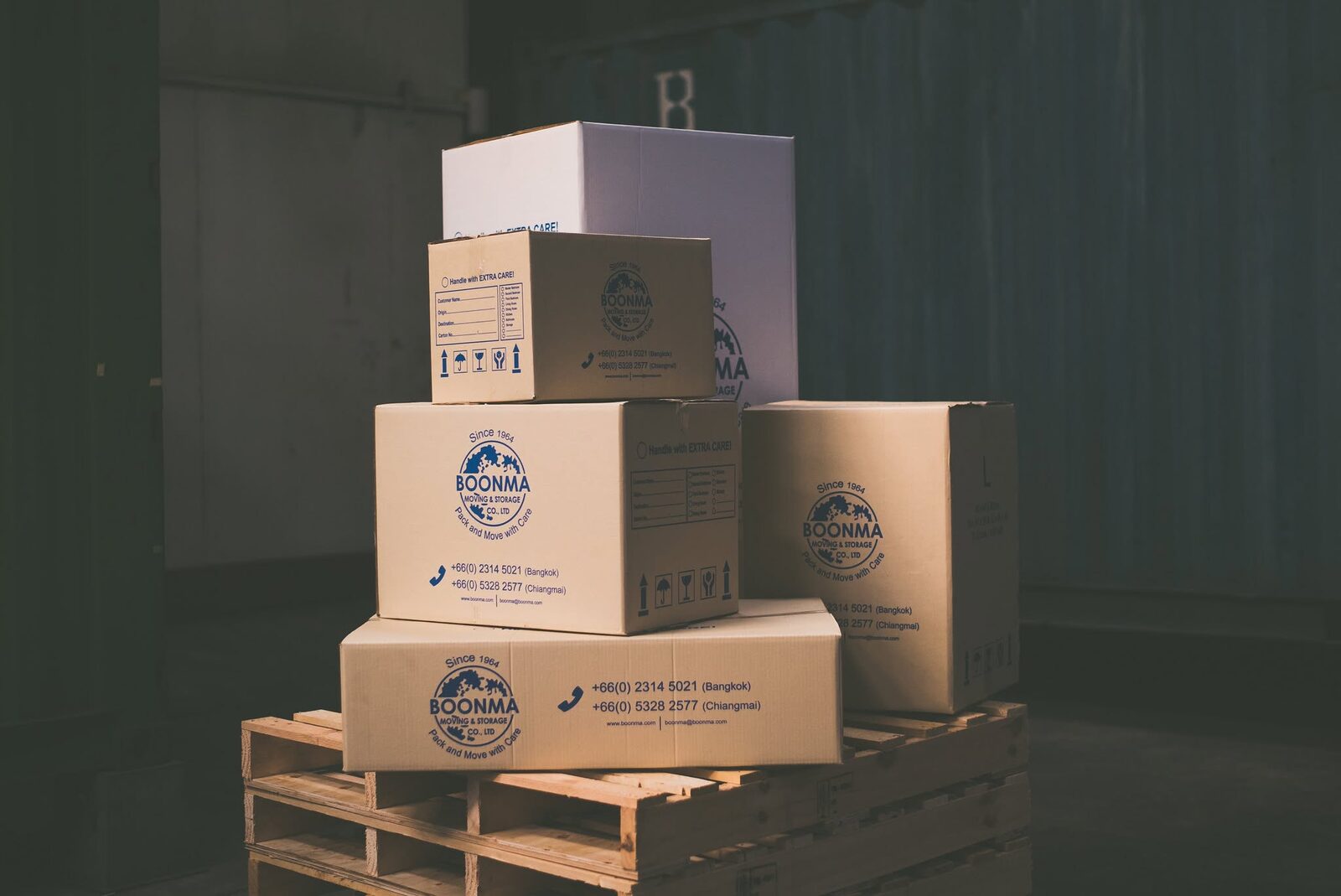Boonma-branded moving boxes packed and ready